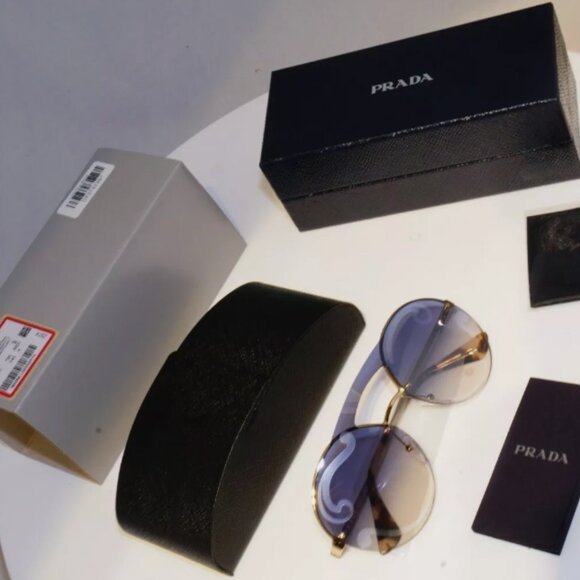 Prada Womens Round Swirl Gold Sunglasses